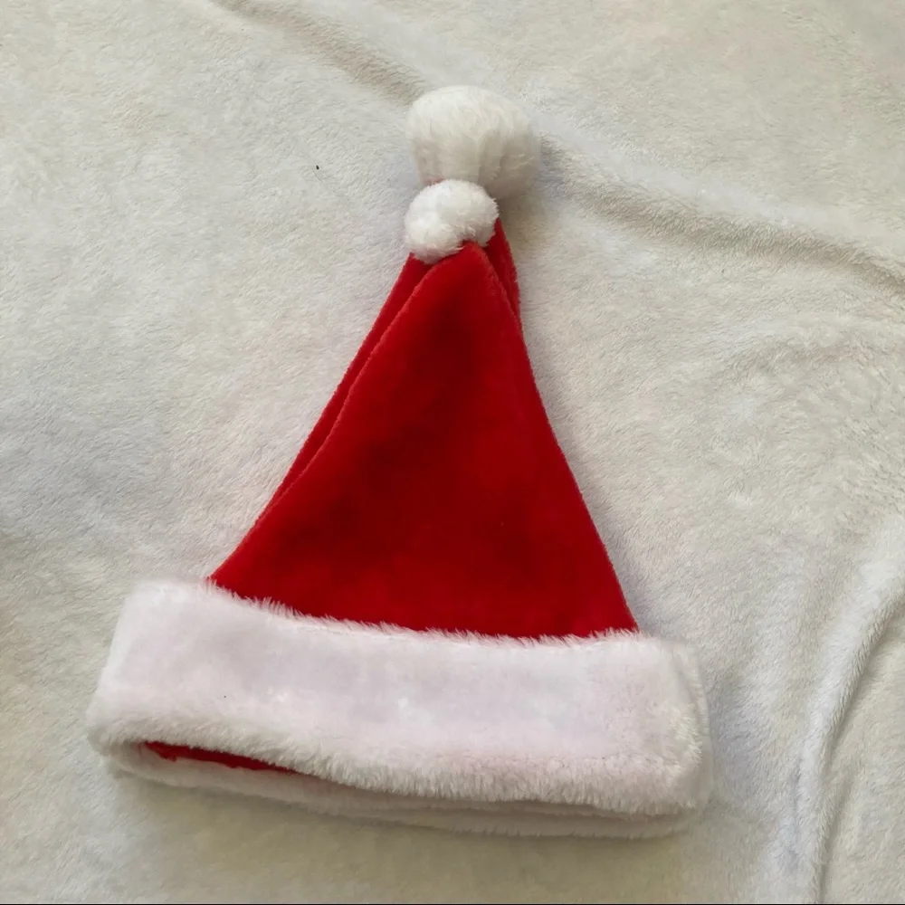Set of two Santa hats with white pompoms